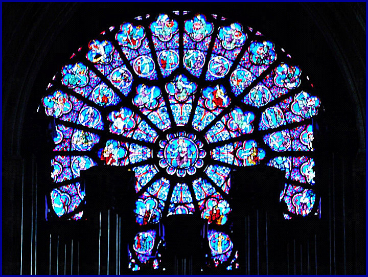 West rose window in Notre Dame, Paris titled “la lachete” cowardice in English